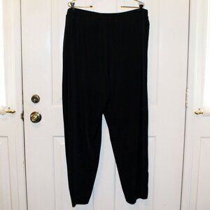 Susan Graver 1X black Liquid Knit Pants with three oval brass grommets on each l